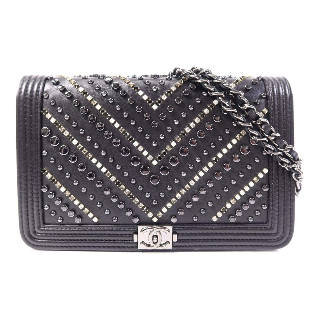 Black Calfskin CHANEL Wallet On Chain Shoulder Purse with Silver Hardware: Black Calfskin CHANEL Wallet On Chain Shoulder Purse with Silver Hardware This CHANEL Wallet On Chain (WOC) shoulder bag is crafted from black calfskin leather and features the iconic CC logo. Designe