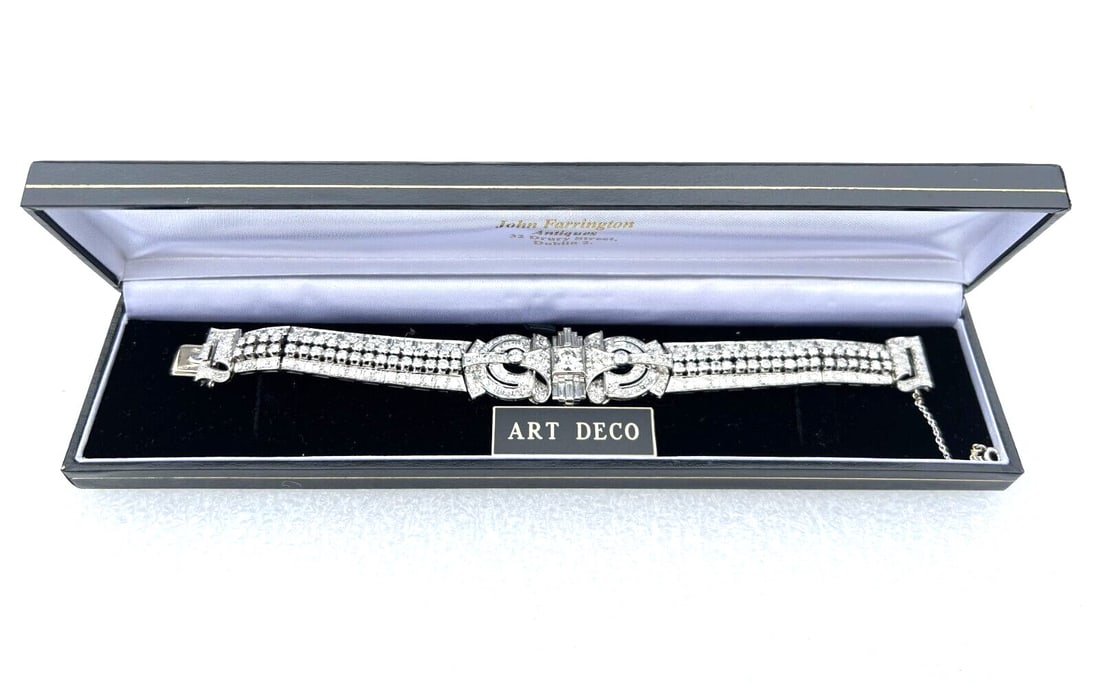 French Art Deco Platinum Diamond Bracelet 0.90 ct Center 16 ct F VS: French Art Deco Platinum Diamond Bracelet 0.90 ct Center 16 ct F VS This exquisite French Art Deco bracelet, crafted in platinum, showcases intricate design and superior workmanship. Featuring a stunn