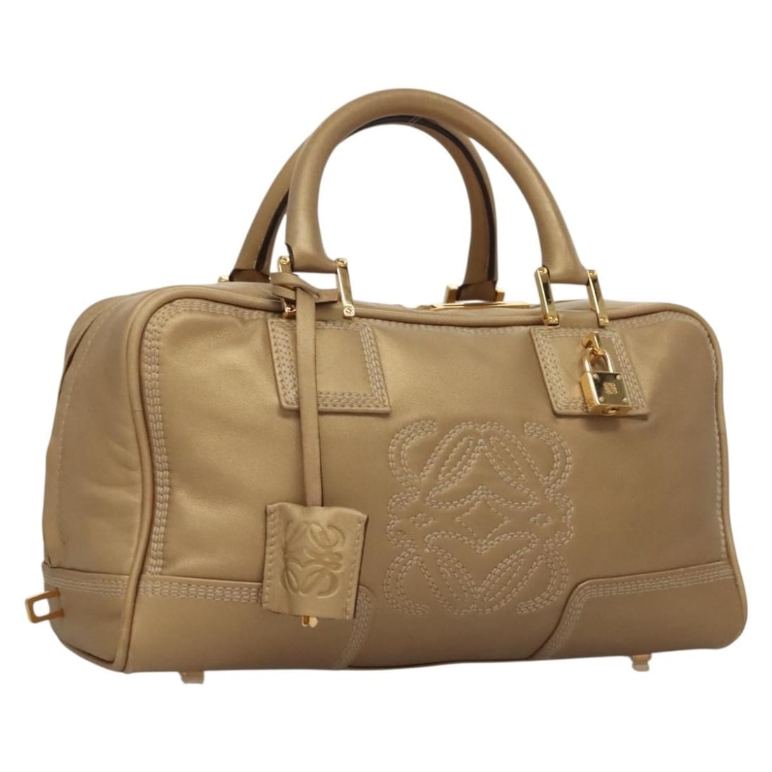 Loewe Gold Leather Amazona Handbag 28cm x 16cm x 12cm: Loewe Gold Leather Amazona Handbag 28cm x 16cm x 12cm This Loewe Amazona Bag for women features a gold leather exterior with metal fittings. The bag measures 28cm x 16cm x 12cm and is made in Spain. T