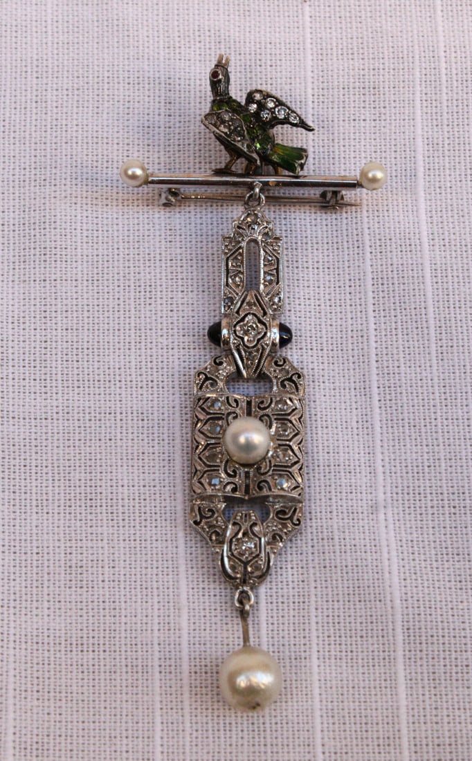 Art Deco French Platinum Diamond Pearl Enamel Bird Pendant-Brooch: Art Deco French Platinum Diamond Pearl Enamel Bird Pendant-Brooch Discover the elegance of this magnificent original Art Deco French brooch-pendant, expertly crafted from .999 fine platinum. Adorned w