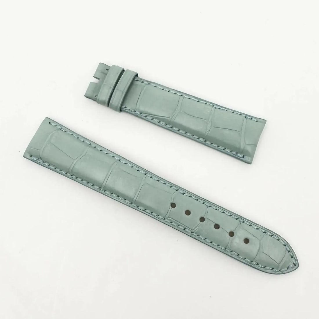 Bvlgari 16mm Blue Alligator Leather Two-Piece Watch Strap: Bvlgari 16mm Blue Alligator Leather Two-Piece Watch Strap Elevate your timepiece with this exquisite Bvlgari wristwatch band, crafted from luxurious blue alligator leather. Designed as a two-piece str