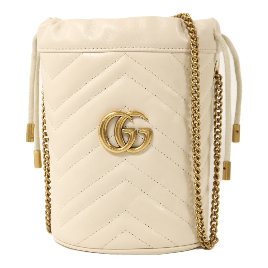White Gucci GG Marmont Calfskin Bucket Shoulder Bag With Gold Hardware: White Gucci GG Marmont Calfskin Bucket Shoulder Bag With Gold Hardware This is a Gucci GG Marmont bucket shoulder bag crafted from white calfskin leather. The bag features gold-tone hardware, a regula