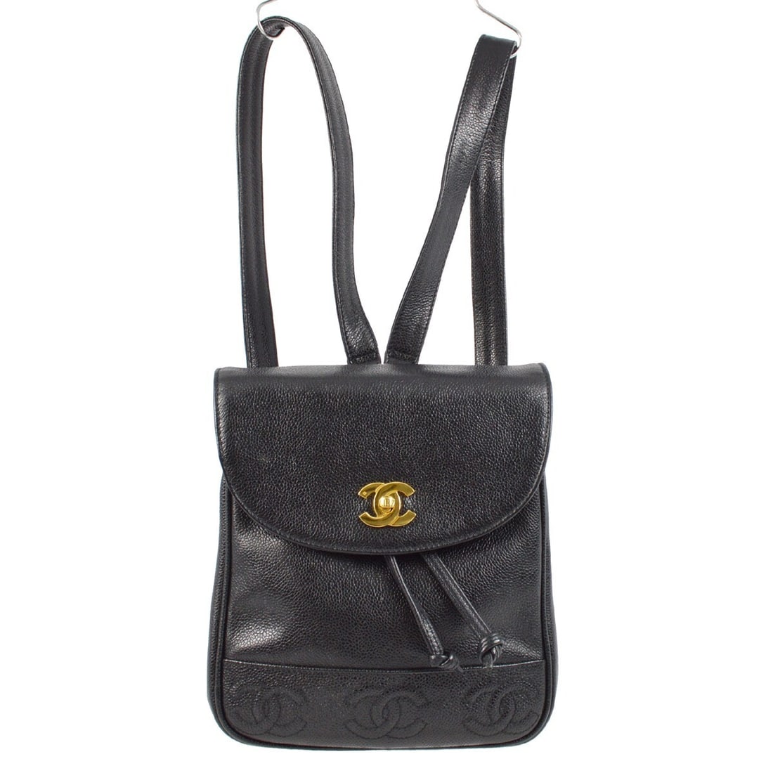 Chanel Caviar Leather Medium Triple CC Logo Black Backpack with Turnlock: Chanel Caviar Leather Medium Triple CC Logo Black Backpack with Turnlock This Chanel backpack features black caviar skin leather with triple CC logo accents and a drawstring turnlock closure. The medi