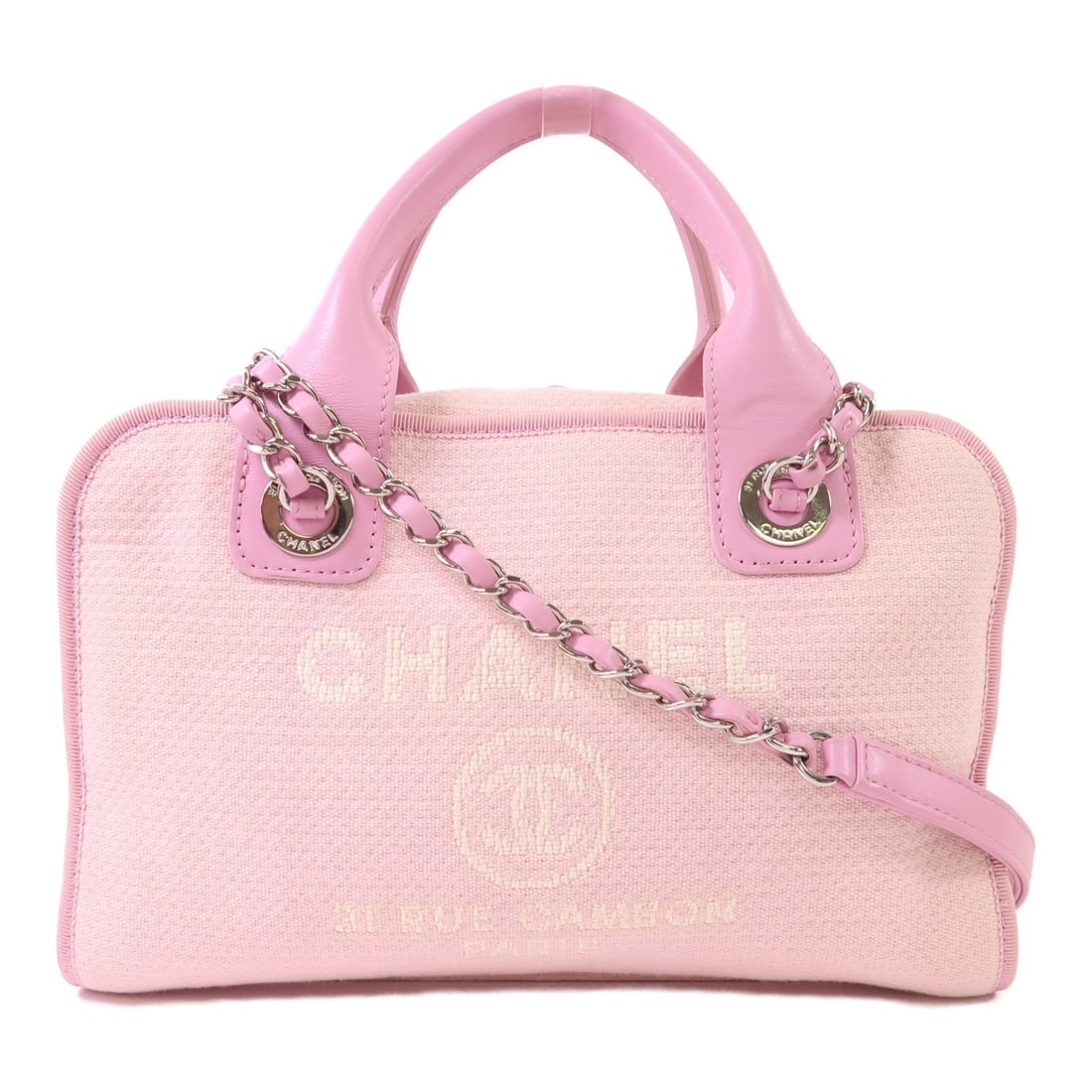 Chanel Deauville Pink Canvas 2 Way Bowling Shoulder Bag Model A92749: Chanel Deauville Pink Canvas 2 Way Bowling Shoulder Bag Model A92749 This CHANEL Deauville Bowling Bag features a versatile 2-way shoulder design crafted from pink canvas. Made in France, it showcases