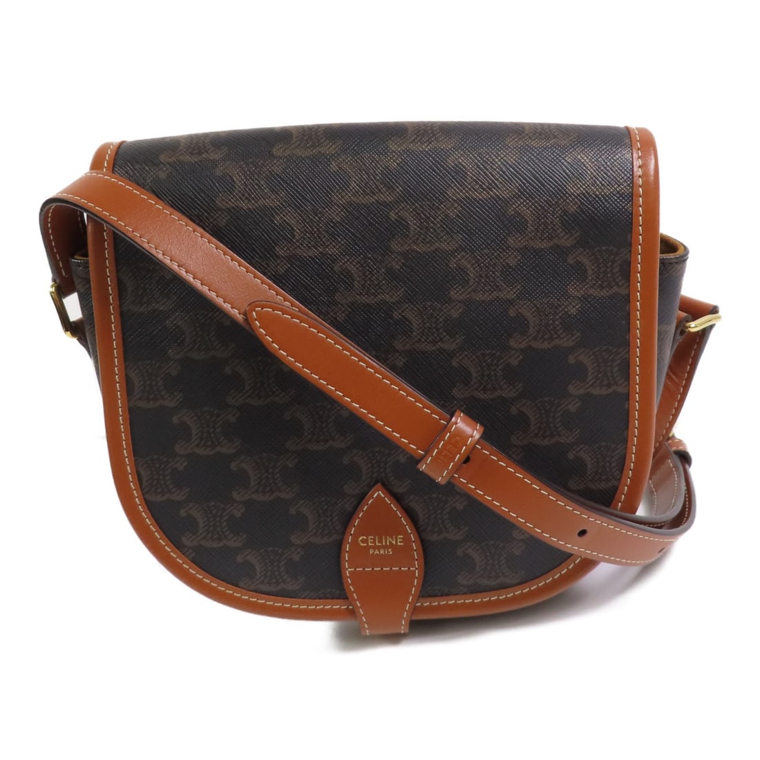 CELINE Folco Brown Coated Canvas Shoulder Bag with Gold Hardware: CELINE Folco Brown Coated Canvas Shoulder Bag with Gold Hardware This CELINE Folco shoulder bag features the iconic Trionphe canvas in a brown PVC coated finish. Designed as a crossbody, it offers bot