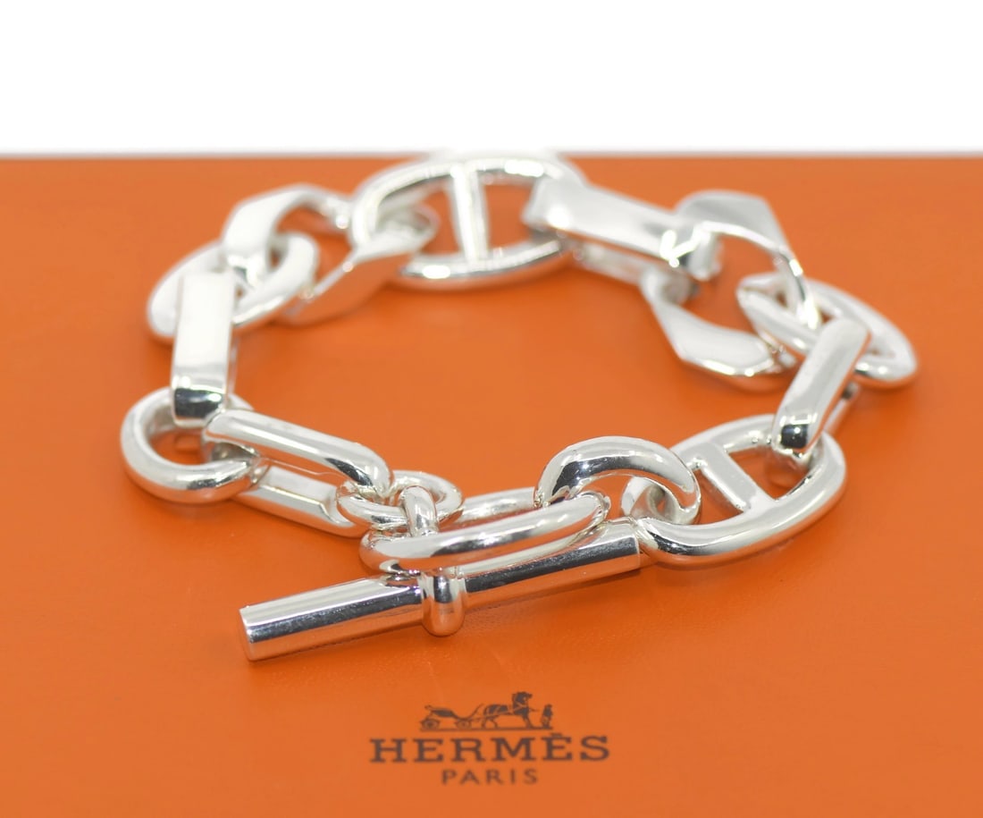 Sterling Silver Alea GM Patine Bracelet by Hermes 8.5 Inch with Box: Sterling Silver Alea GM Patine Bracelet by Hermes 8.5 Inch with Box This Hermes Alea GM Patine bracelet is crafted from sterling silver with a 925 metal purity. Featuring a chain style and a substanti