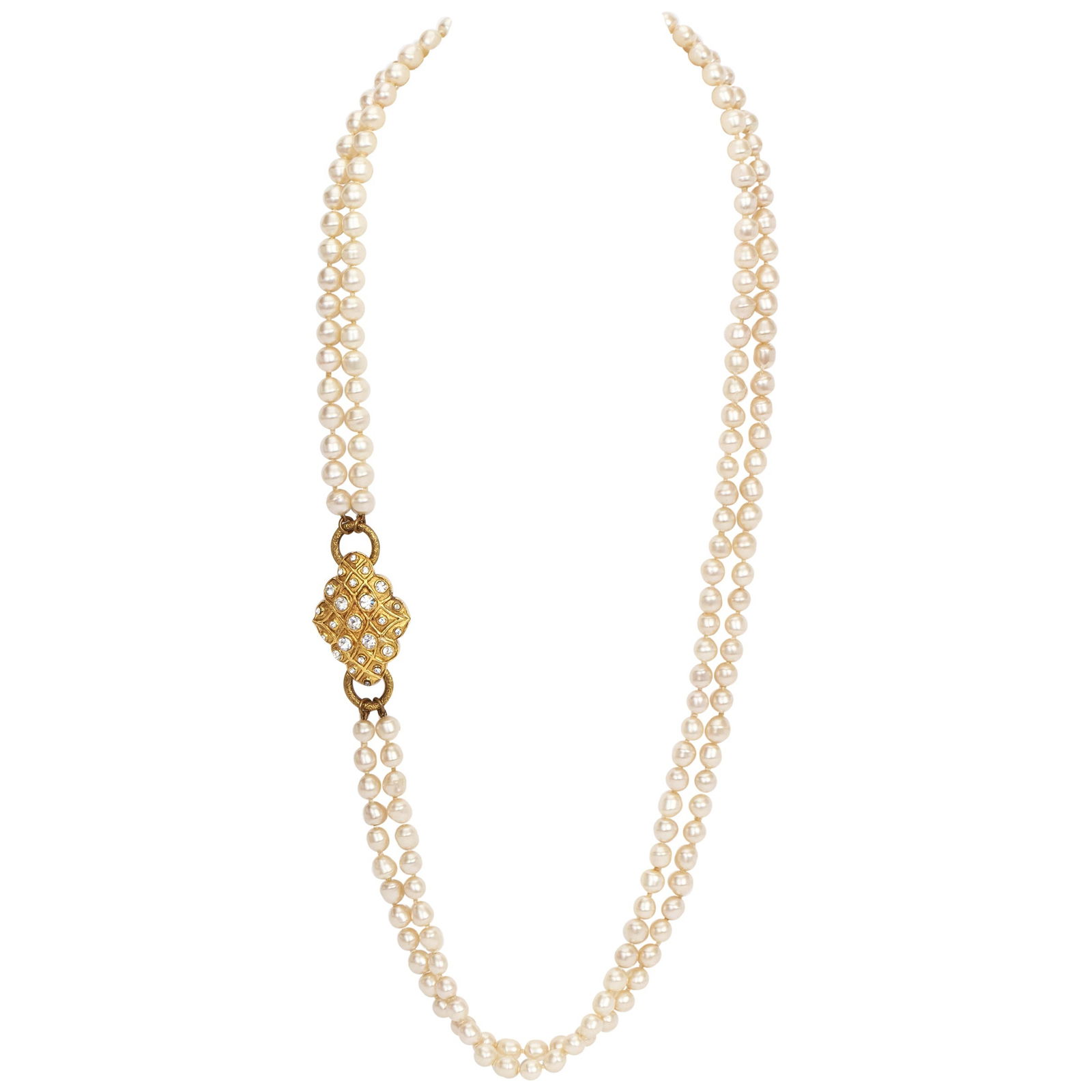 1970s Chanel Gold Pearl Two-Strand Necklace with Medallion: 1970s Chanel Gold Pearl Two-Strand Necklace with Medallion This exquisite vintage Chanel necklace from the 1970s features a stunning two-strand design, adorned with lustrous pearls and an eye-catching