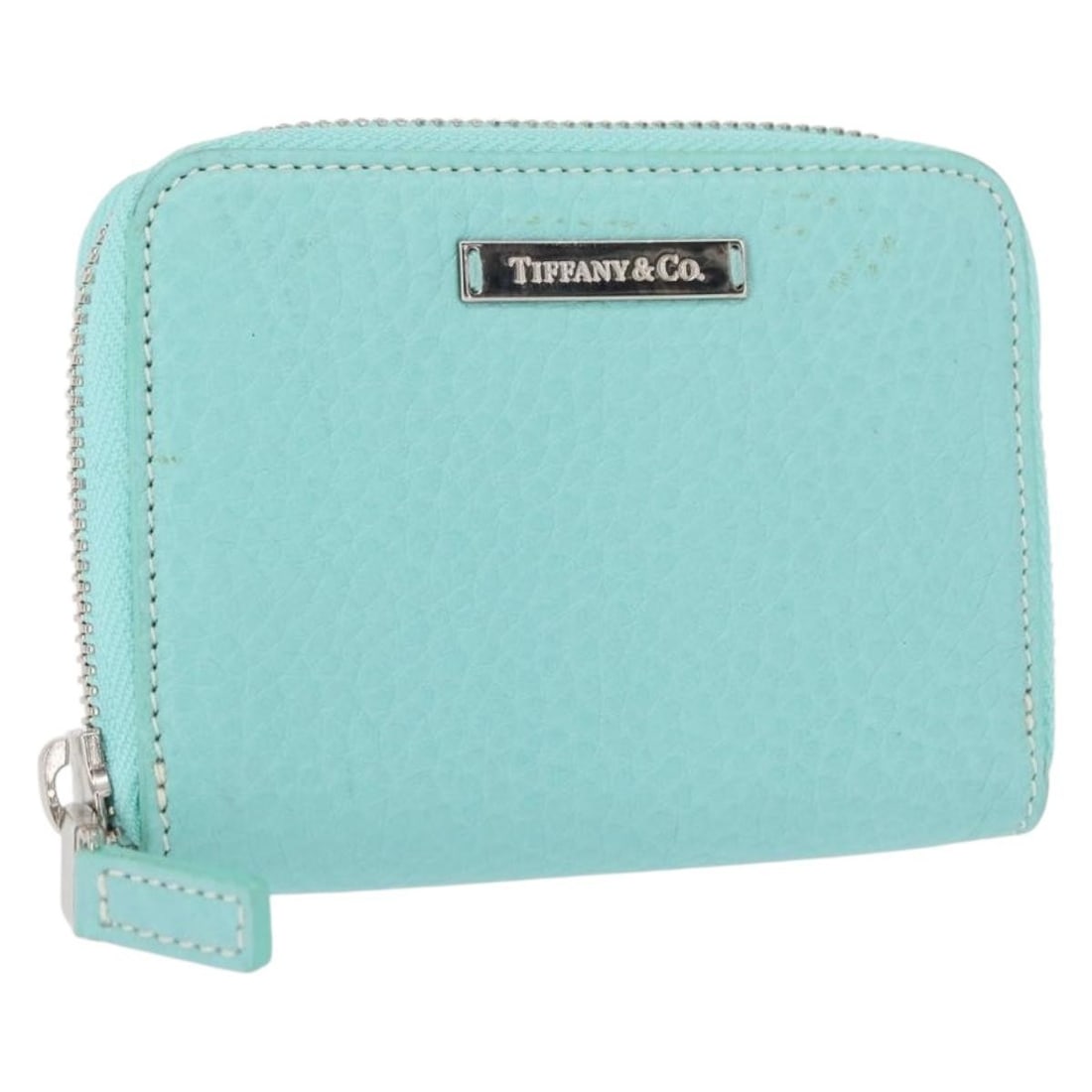 TIFFANY&Co. Leather Coin Purse Turquoise Blue Authentic Italy: TIFFANY&Co. Leather Coin Purse Turquoise Blue Authentic Italy This authentic Tiffany & Co. coin purse is crafted from high-quality leather in a stunning turquoise blue color. Made in Italy, this styli