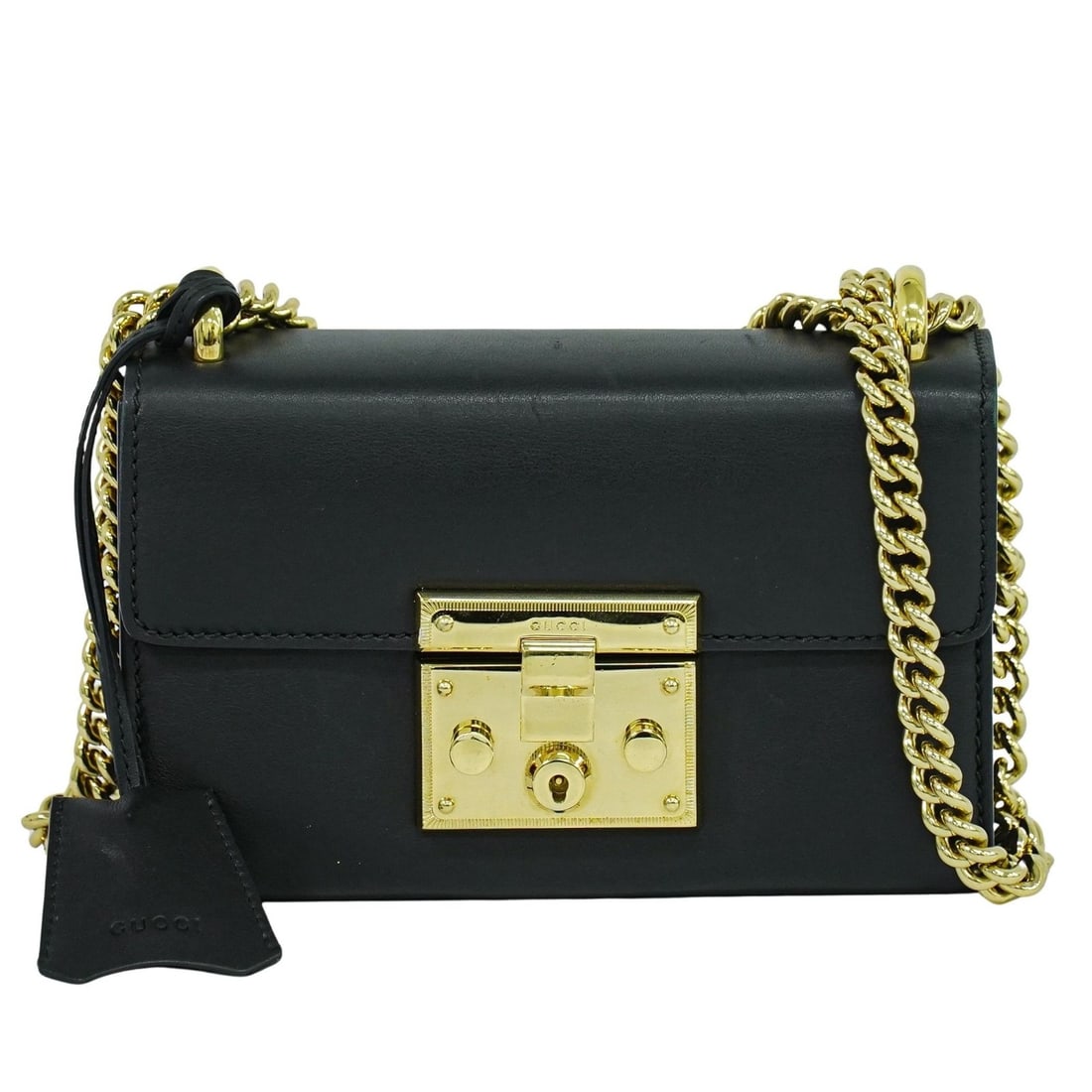 Black Leather Gucci Padlock Crossbody Bag 19cm by 12cm by 7cm: Black Leather Gucci Padlock Crossbody Bag 19cm by 12cm by 7cm This pre-owned Gucci Padlock shoulder bag for women features black leather construction with a compact design. It shows typical signs of u