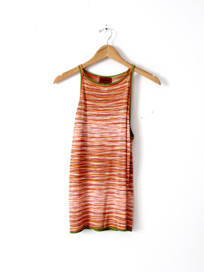 Vintage Missoni Multicolor Knit Tank Top 100% Rayon: Vintage Missoni Multicolor Knit Tank Top 100% Rayon Embrace the timeless charm of this vintage Missoni knit tank top, crafted from 100% slinky rayon. Adorned with the iconic multicolor pattern featuri