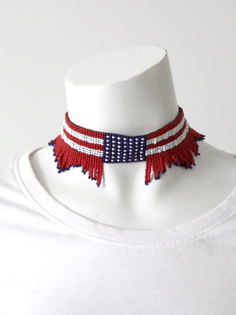 Patriotic Vintage American Flag Beaded Choker Necklace: Patriotic Vintage American Flag Beaded Choker Necklace This Vintage American Flag Beaded Choker Necklace is a unique piece from our Stylist Collection. It features a striking American flag design, met