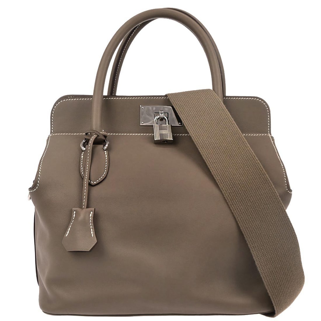 Hermes Toolbox 26 Etoupe Gray Swift Leather Medium 2way Top Handle Bag: Hermes Toolbox 26 Etoupe Gray Swift Leather Medium 2way Top Handle Bag This Hermes Toolbox 26 handbag features a sophisticated Etoupe gray color crafted from high-quality leather. Designed with a medi