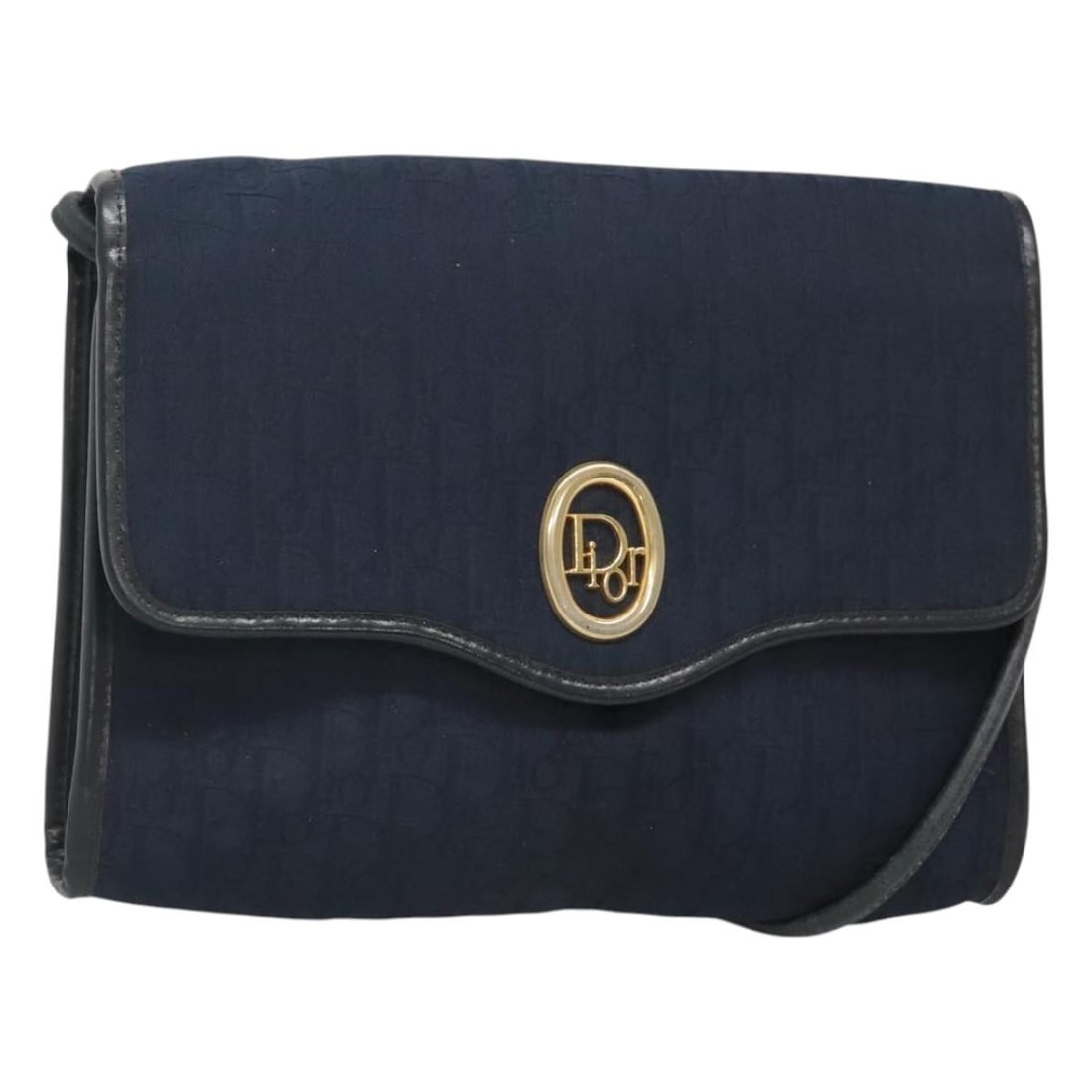 Christian Dior Navy Canvas Vintage Trotter Flap Shoulder Bag: Christian Dior Navy Canvas Vintage Trotter Flap Shoulder Bag Christian Dior vintage Trotter flap shoulder bag crafted from navy canvas with leather details. Shows signs of wear including surface rubbi