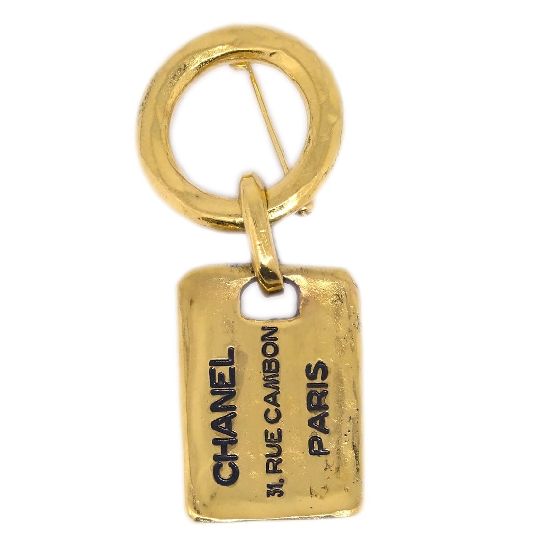 Chanel Gold-Plated Clover Brooch Pin 1133: Chanel Gold-Plated Clover Brooch Pin 1133 This elegant Chanel brooch pin features a charming clover shape, beautifully crafted in gold plate. With a length of 2 inches, it adds a touch of sophisticati