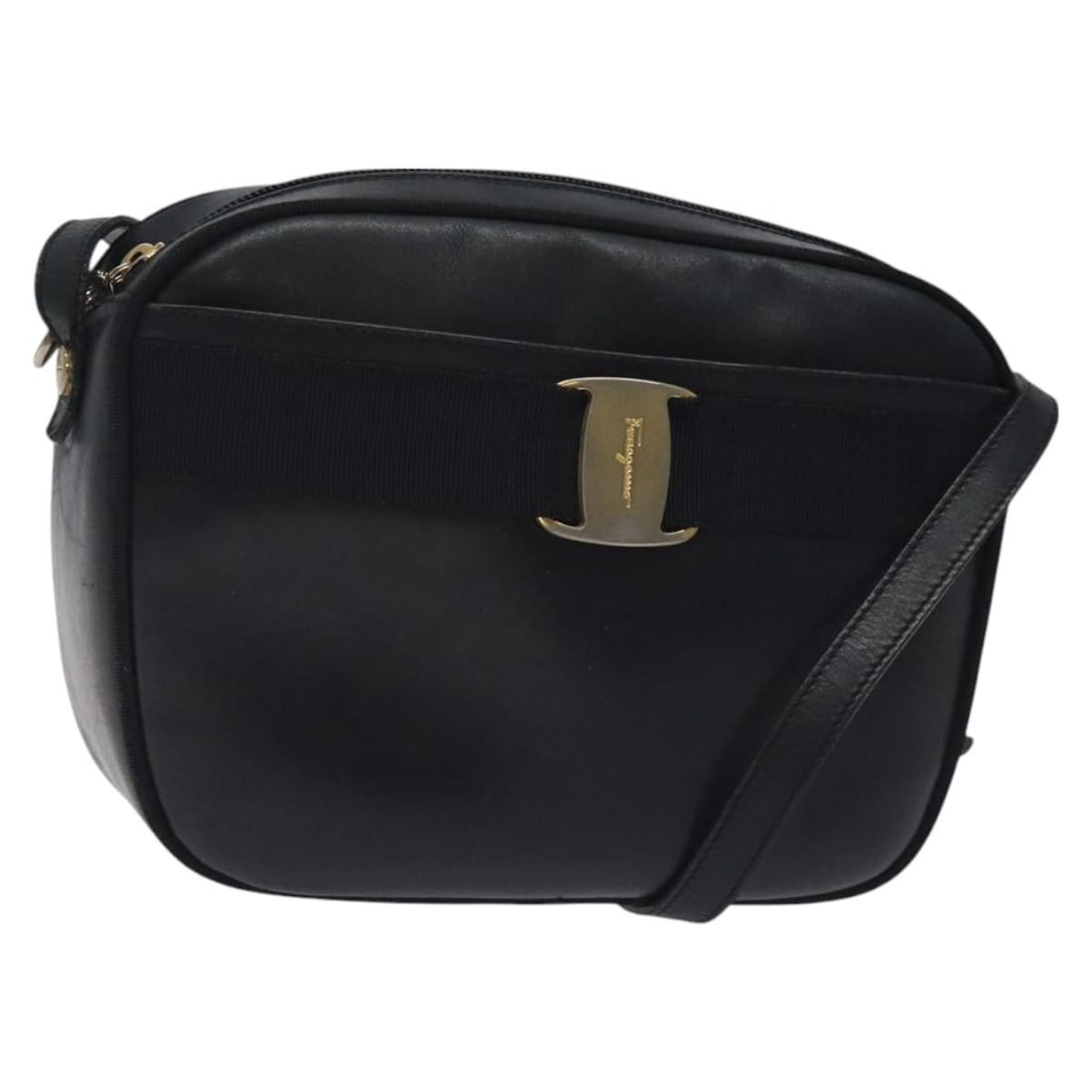 Vala Navy Leather Shoulder Bag by Salvatore Ferragamo: Vala Navy Leather Shoulder Bag by Salvatore Ferragamo This Salvatore Ferragamo Vala shoulder bag is crafted from navy leather and features a structured silhouette. Designed for women, it offers a spac