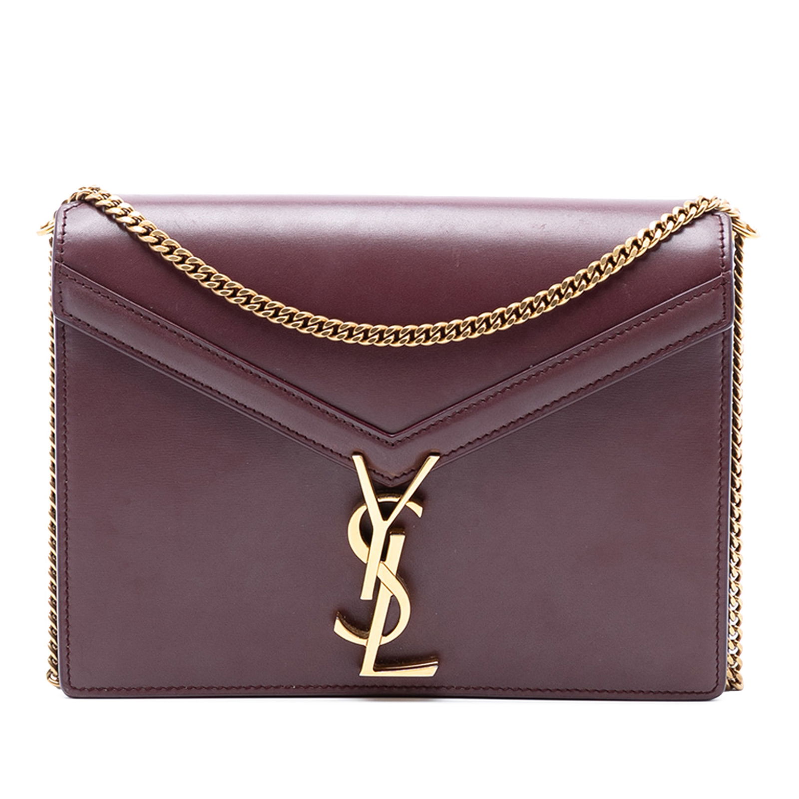 Red Leather Cassandra Flap Bag with YSL Logo by Saint Laurent: Red Leather Cassandra Flap Bag with YSL Logo by Saint Laurent This Saint Laurent Smooth Calfskin Monogram Cassandra Clasp Bag features a red leather body, a chain link strap, a front flap with a metal