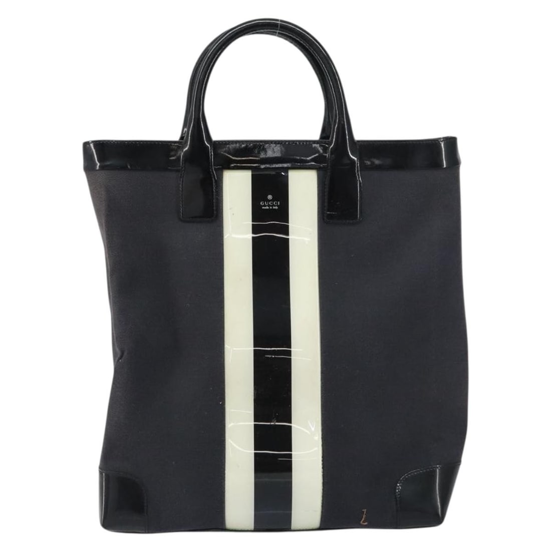 Black Canvas Gucci Vintage Tote Bag for Women: Black Canvas Gucci Vintage Tote Bag for Women This Gucci vintage tote is crafted from black canvas and designed for women. Made in Italy, it features a spacious silhouette ideal for everyday use. The