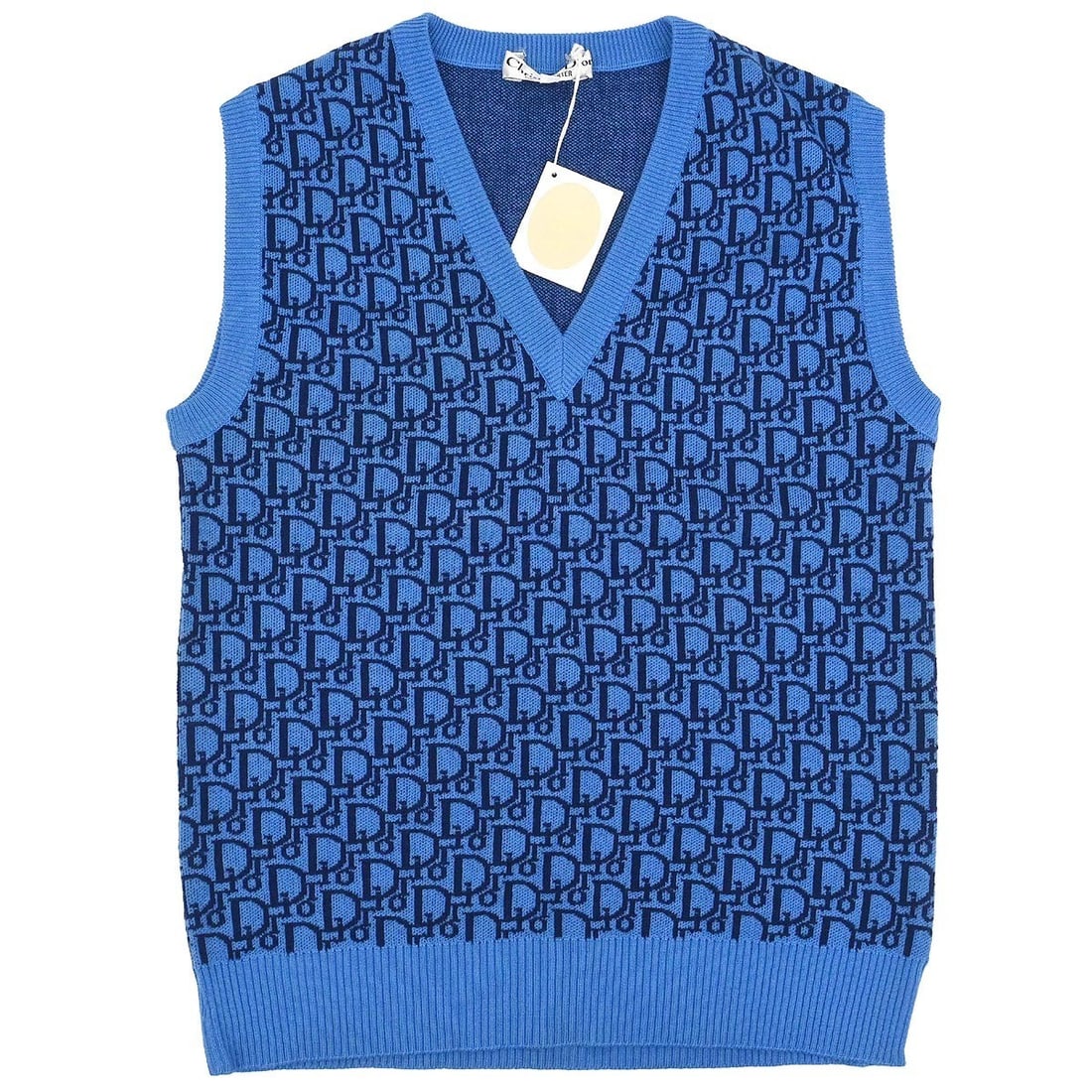 Dior Trotter Blue Wool Vest Top Size L Sleeveless V-Neck Logo Accent: Dior Trotter Blue Wool Vest Top Size L Sleeveless V-Neck Logo Accent This Christian Dior vest sweater features the signature Trotter design in blue. Made from 100% wool, it offers a sleeveless, V-neck