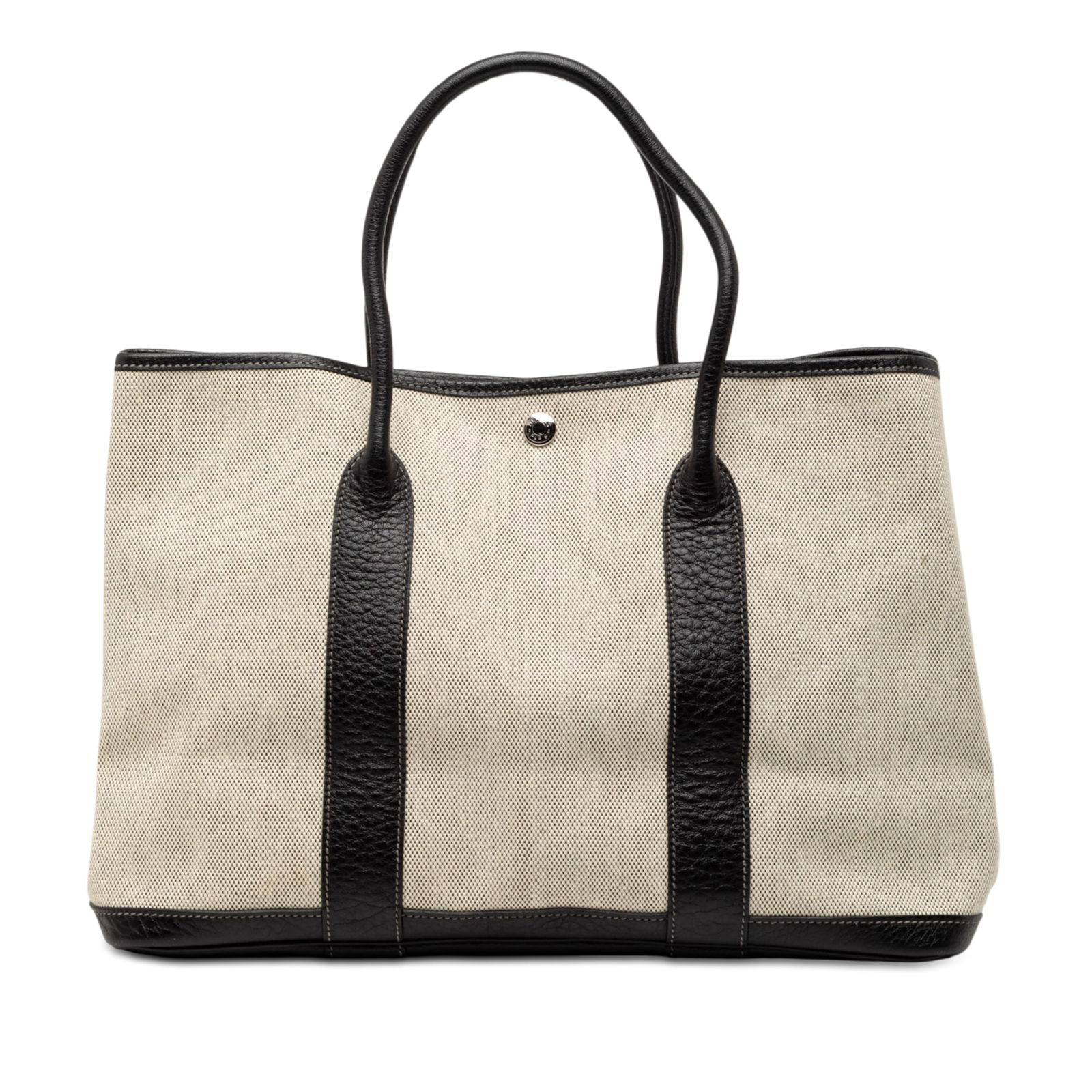 Toile and Negonda Garden Party 36 canvas and leather handbag by Hermes: Toile and Negonda Garden Party 36 canvas and leather handbag by Hermes This Hermes Garden Party 36 bag features a combination of canvas and leather, with rolled leather handles and a top snap button c