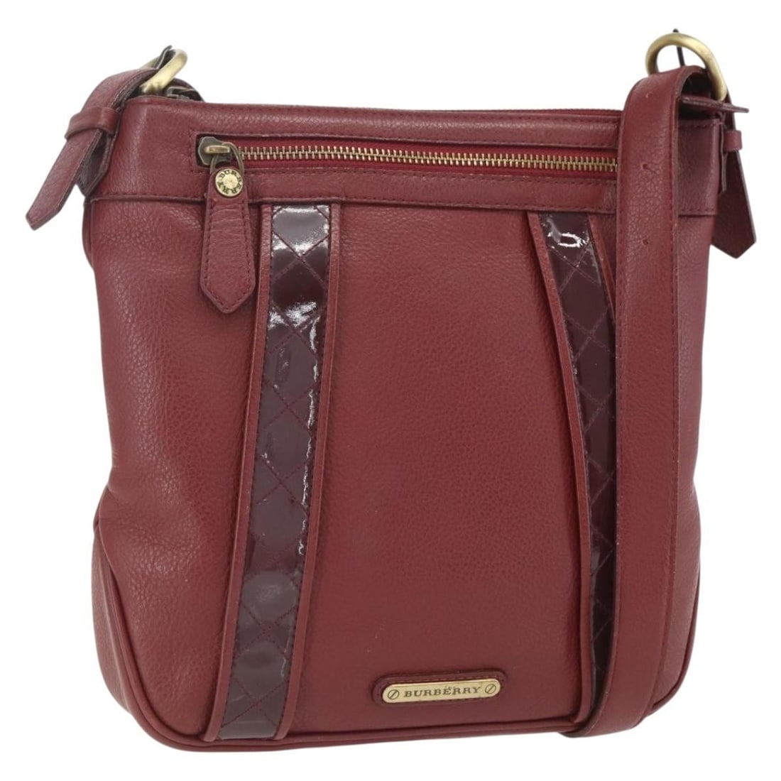 Red Leather Burberry Vintage Shoulder Bag for Women: Red Leather Burberry Vintage Shoulder Bag for Women This Burberry vintage shoulder bag is crafted from red leather and designed for women. The bag features a classic silhouette with a spacious interio