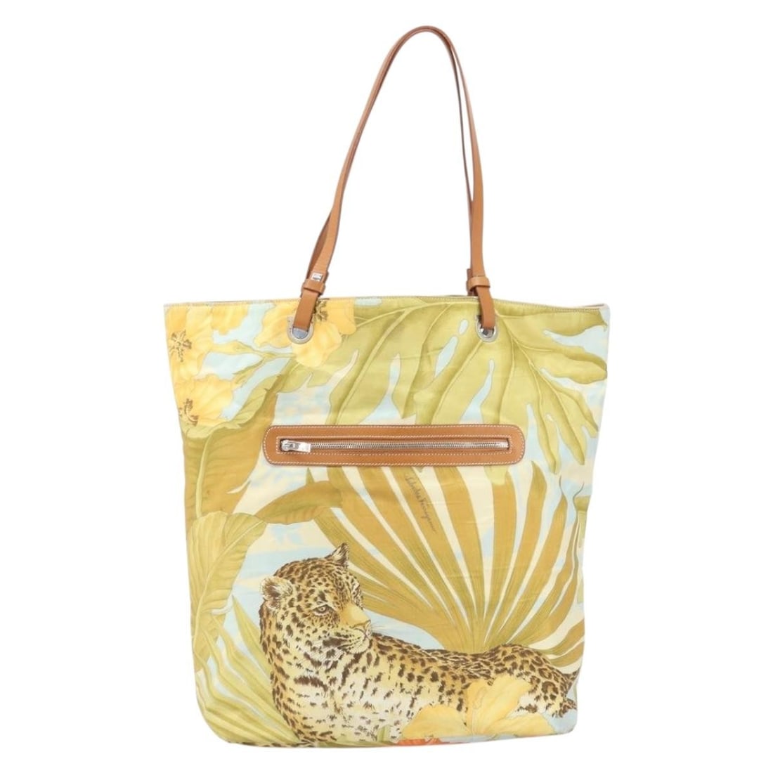 Vintage Nylon Multicolor Tote by Salvatore Ferragamo: Vintage Nylon Multicolor Tote by Salvatore Ferragamo This Salvatore Ferragamo vintage tote bag features a multicolored nylon exterior and is designed for women. The bag displays some signs of wear, in