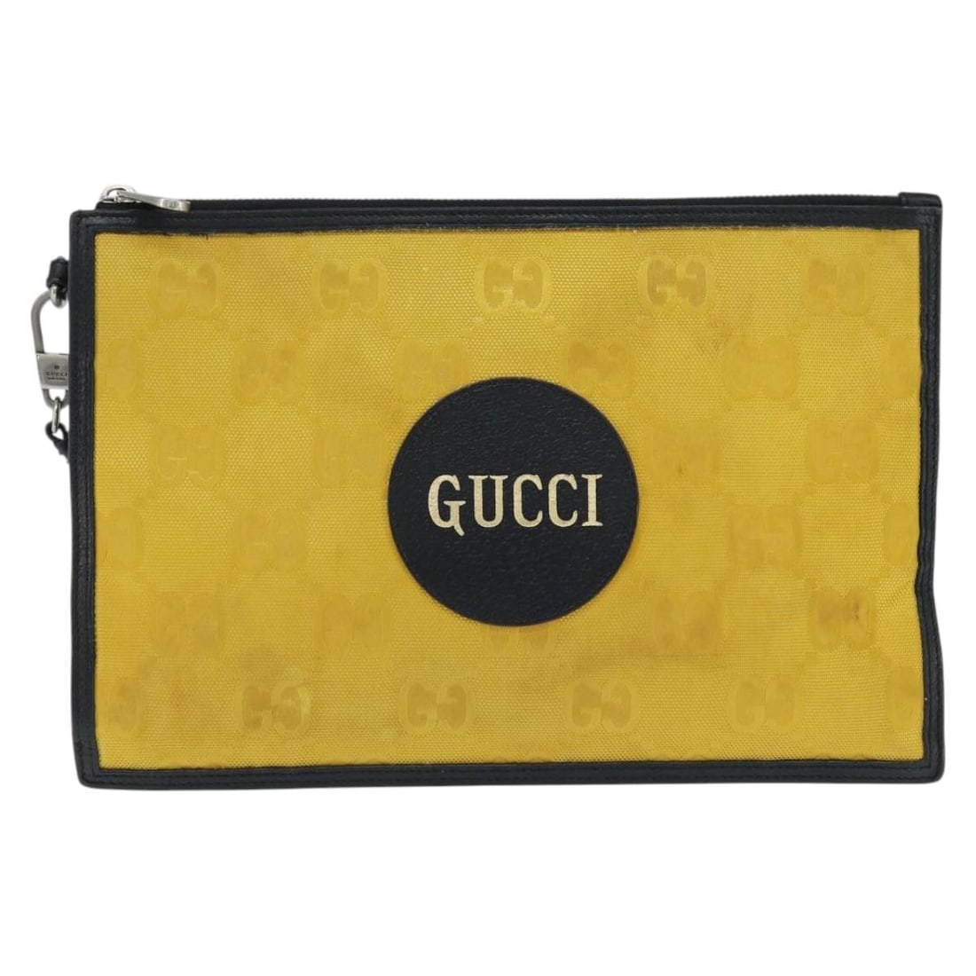 Yellow Gucci Off The Grid GG Canvas Unisex Zip Pouch Bag: Yellow Gucci Off The Grid GG Canvas Unisex Zip Pouch Bag This is a Gucci Off The Grid Zip Pouch, crafted from yellow canvas and designed for unisex use. This pre-owned clutch bag is in good condition,