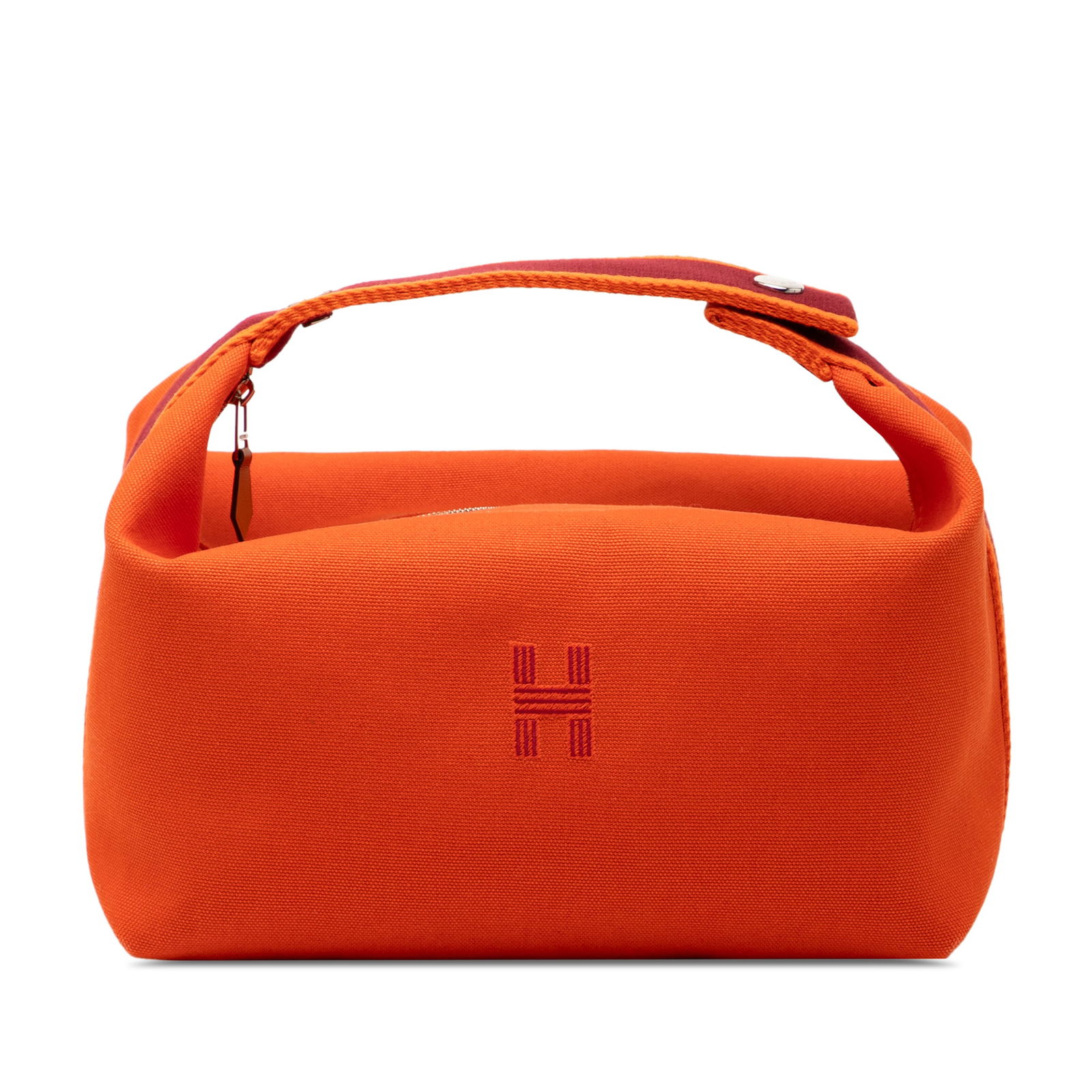 Large Canvas Bride-A-Brac Travel Case by Hermes Orange: Large Canvas Bride-A-Brac Travel Case by Hermes Orange This Hermes Large Toile Bride-A-Brac travel case features a durable canvas body in an orange hue, a flat handle for easy carrying, a top zip clos