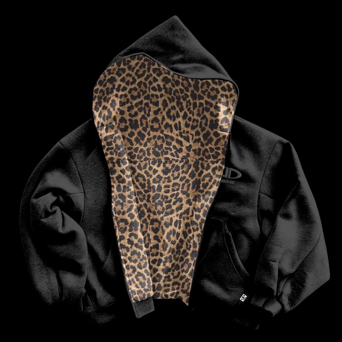 Reversible Zip-Up Hoodie with Black and Cheetah Print by Carpe Diem Rosettes: Reversible Zip-Up Hoodie with Black and Cheetah Print by Carpe Diem Rosettes The Carpe Diem Rosettes Reversible Zip-Up Hoodie offers a versatile two-in-one design with a solid black side for a classic