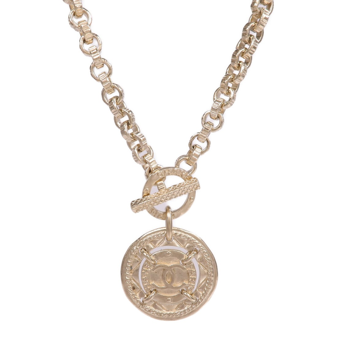 Gold Tone CC Pendant Necklace by CHANEL: Gold Tone CC Pendant Necklace by CHANEL This CHANEL CC necklace features a gold-tone metal design with no main stone, crafted in France. It is in very good condition and showcases the iconic CC logo,