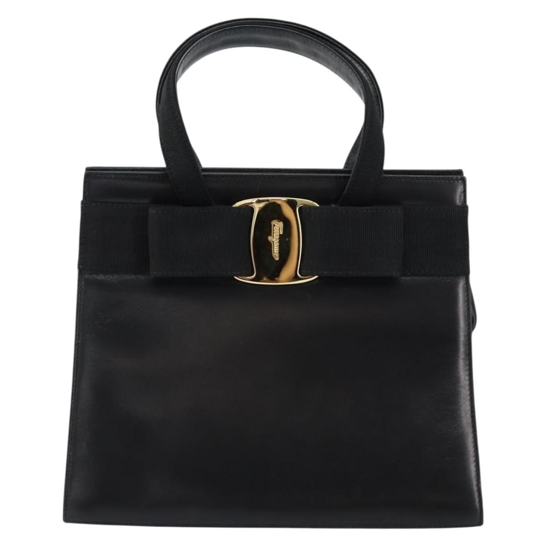 Black Leather Convertible Tote with Vara Bow by Salvatore Ferragamo: Black Leather Convertible Tote with Vara Bow by Salvatore Ferragamo This Salvatore Ferragamo Convertible Vara Bow Tote is crafted from black leather and designed for women. The bag features the signat