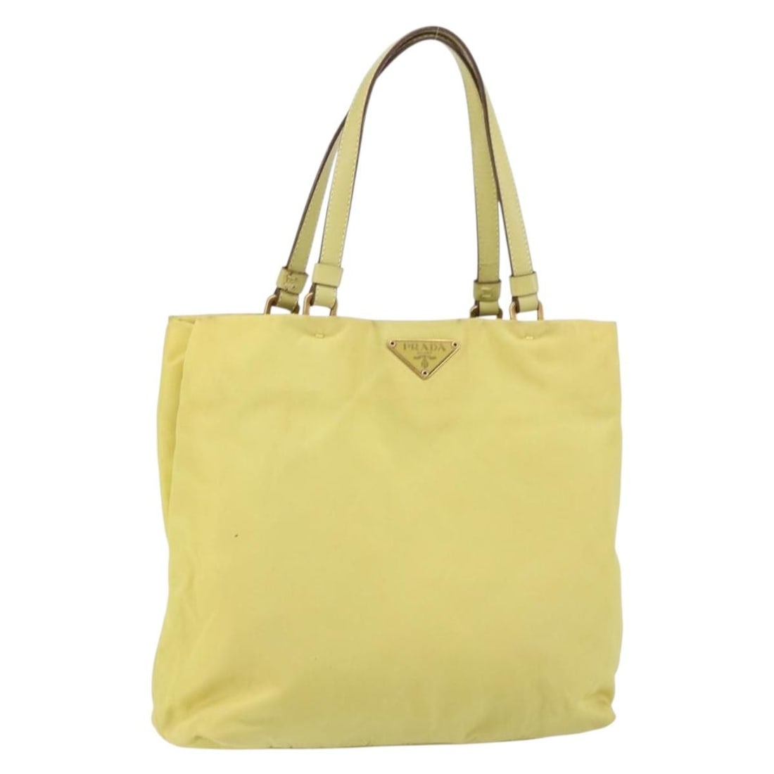 Yellow Nylon Prada Vintage Tote Bag 24cm by 23cm by 6cm: Yellow Nylon Prada Vintage Tote Bag 24cm by 23cm by 6cm This Prada vintage tote for women features yellow nylon material with metal fittings. The bag shows signs of wear including surface shape loss,