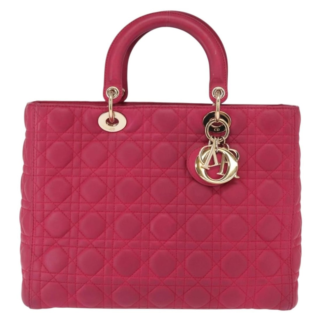 Pink Lady Dior Handbag Cannage Quilted Leather by Christian Dior: Pink Lady Dior Handbag Cannage Quilted Leather by Christian Dior This pre-owned Lady Dior handbag features the signature Cannage quilted lambskin leather in pink. Designed for women, it offers a class
