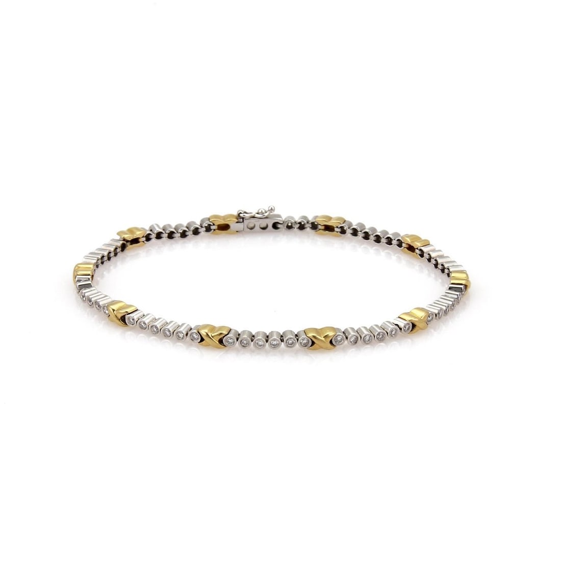 18k Gold Diamond X Link Tennis Bracelet 1.00ct Elegant Design: 18k Gold Diamond X Link Tennis Bracelet 1.00ct Elegant Design This exquisite tennis bracelet is crafted from 18k yellow and white gold, showcasing a stunning high-polished finish. The design features