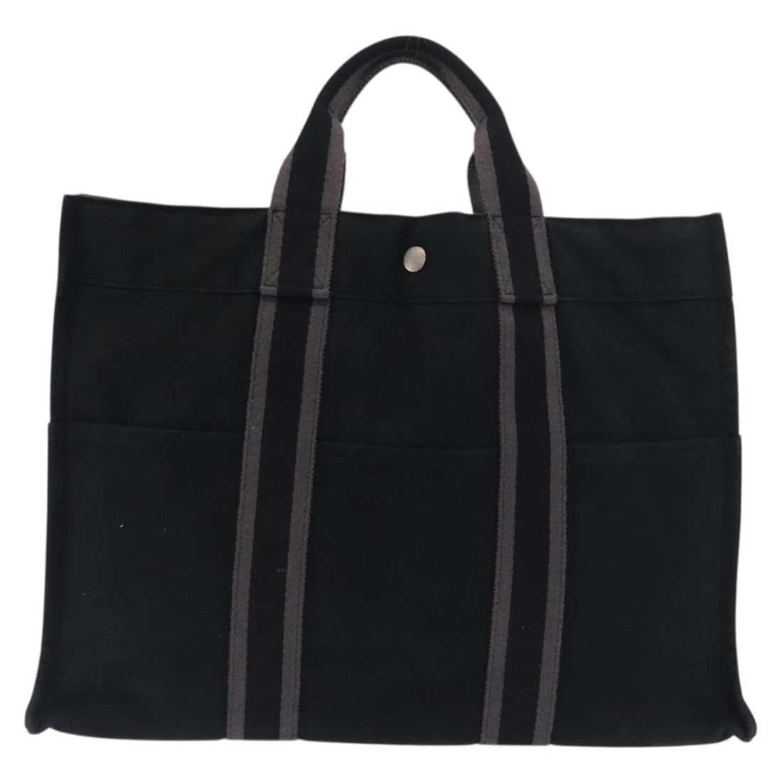 Hermes Canvas Fourre Tout Tote Bag Black 42cm by 30cm by 10cm: Hermes Canvas Fourre Tout Tote Bag Black 42cm by 30cm by 10cm The Hermes Fourre Tout Tote is a unisex black canvas bag crafted in France. It features external and internal wear including surface defor