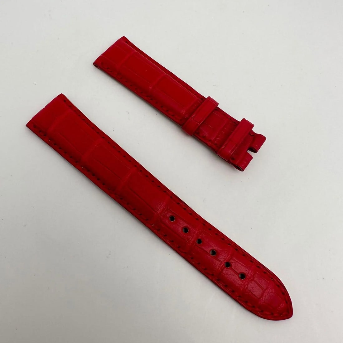 Bvlgari Matt Red Alligator Leather 19mm X 16mm Watch Strap: Bvlgari Matt Red Alligator Leather 19mm X 16mm Watch Strap This Bvlgari wristwatch band features a striking matt red alligator leather design, perfect for adding a touch of luxury to your timepiece. T