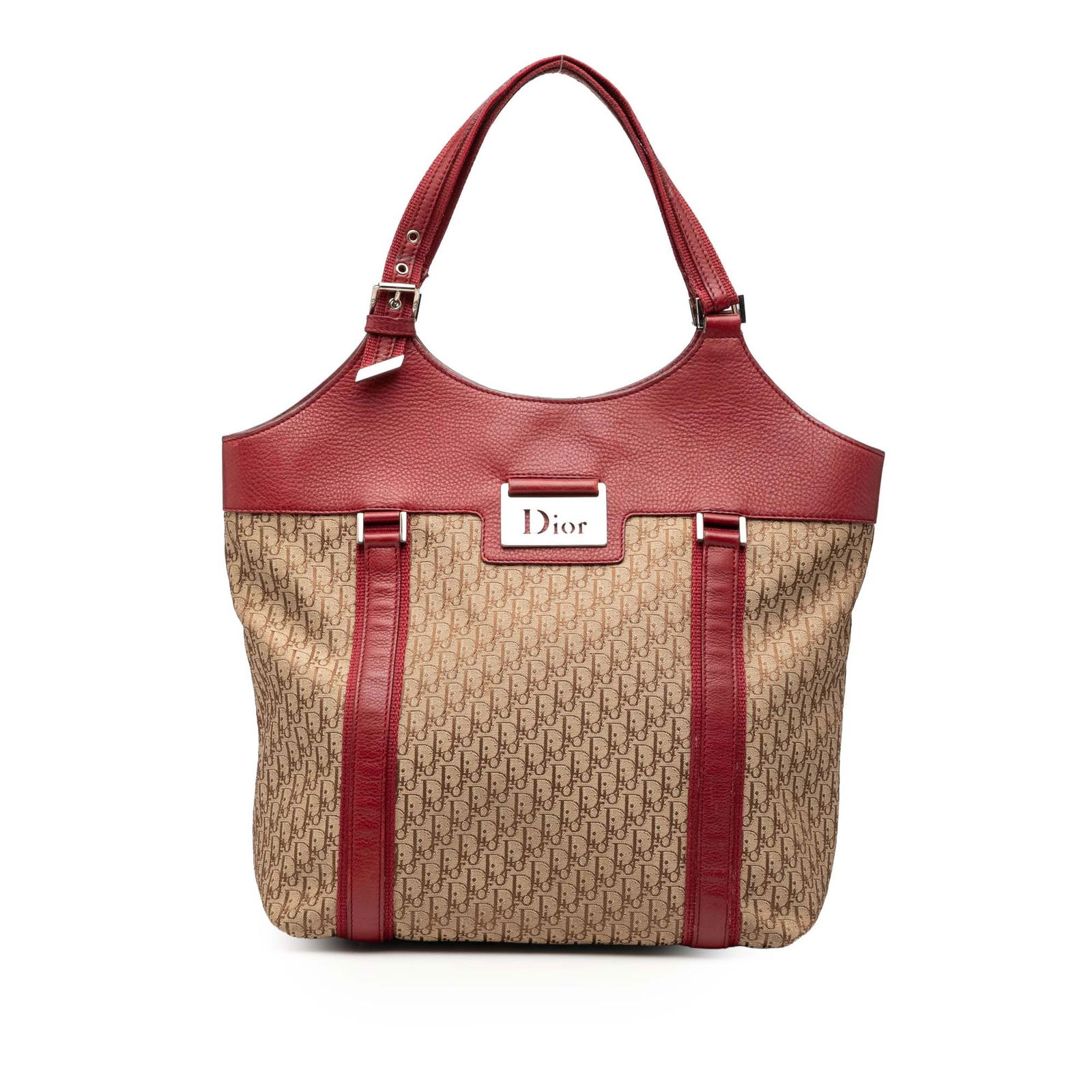 Dior Diorissimo Trotter Canvas Tote Bag with Leather Accents: Dior Diorissimo Trotter Canvas Tote Bag with Leather Accents This Diorissimo Trotter Canvas Street Chic Tote features a canvas body with leather trim, flat leather handles, an open top with magnetic s