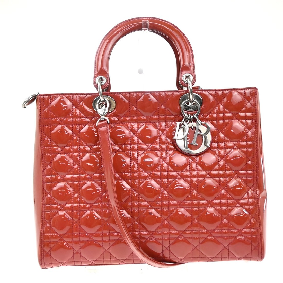Christian Dior Vintage Lady Dior Patent Leather Cannage Quilted Bag: Christian Dior Vintage Lady Dior Patent Leather Cannage Quilted Bag This vintage Christian Dior Lady Dior bag features a red patent leather exterior with the signature Cannage quilt pattern. Designed