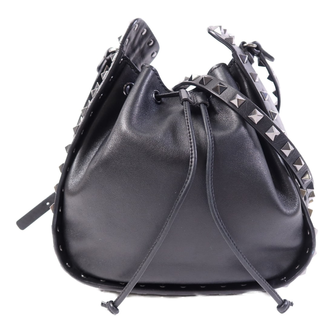 Valentino Black Calfskin Bucket Shoulder Bag with Silver Hardware: Valentino Black Calfskin Bucket Shoulder Bag with Silver Hardware This Valentino bucket shoulder bag is crafted from black calfskin leather, offering a stylish and versatile accessory. The bag feature
