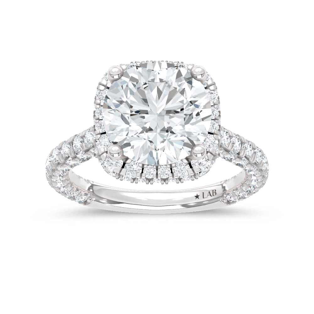 14K White Gold Lab Grown Diamond 6 1/20 Ct.Tw. Engagement Ring (IGI Certified Center 4ct): 14K White Gold Lab Grown Diamond 6 1/20 Ct.Tw. Engagement Ring (IGI Certified Center 4ct) Celebrate your forever moment with the timeless brilliance of our Halo Diamond Engagement Ring. This exquisite