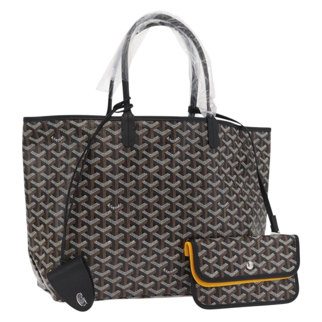 Saint Louis PM Black PVC Tote with Dust Bag and Pouch by Goyard: Saint Louis PM Black PVC Tote with Dust Bag and Pouch by Goyard This GOYARD Saint Louis PM tote bag features a signature herringbone pattern and is crafted from black PVC leather. The bag is in un-use