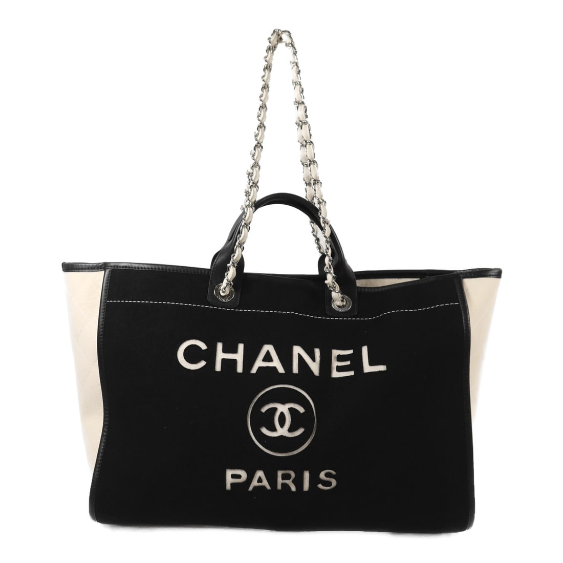 Chanel Deauville White and Black Wool Leather Tote with Silver Tone Chain: Chanel Deauville White and Black Wool Leather Tote with Silver Tone Chain This CHANEL Deauville tote bag features a striking white and black design crafted from wool with leather accents. The spacious