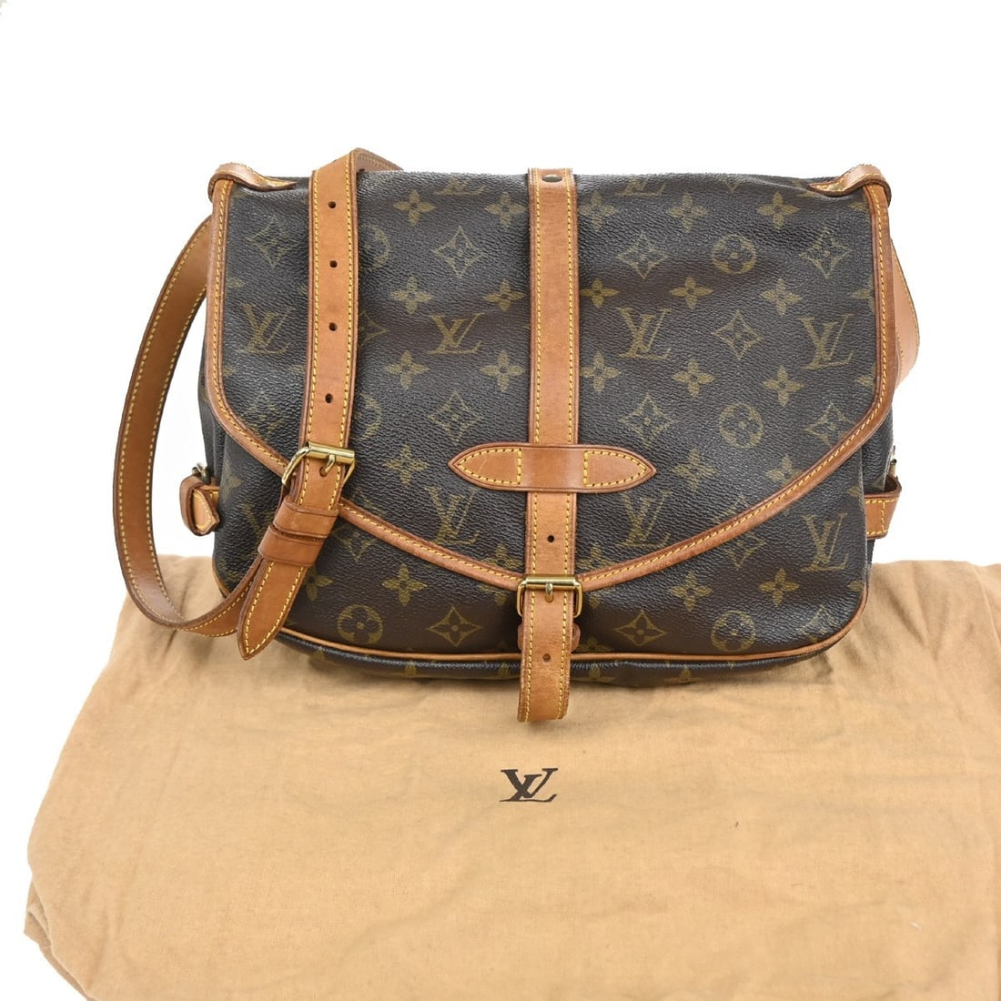 Louis Vuitton Saumur 30 Monogram Canvas Shoulder Bag Brown France: Louis Vuitton Saumur 30 Monogram Canvas Shoulder Bag Brown France The Louis Vuitton Saumur Handbag features the iconic Monogram canvas in brown and is designed for women. This pre-owned shoulder bag f