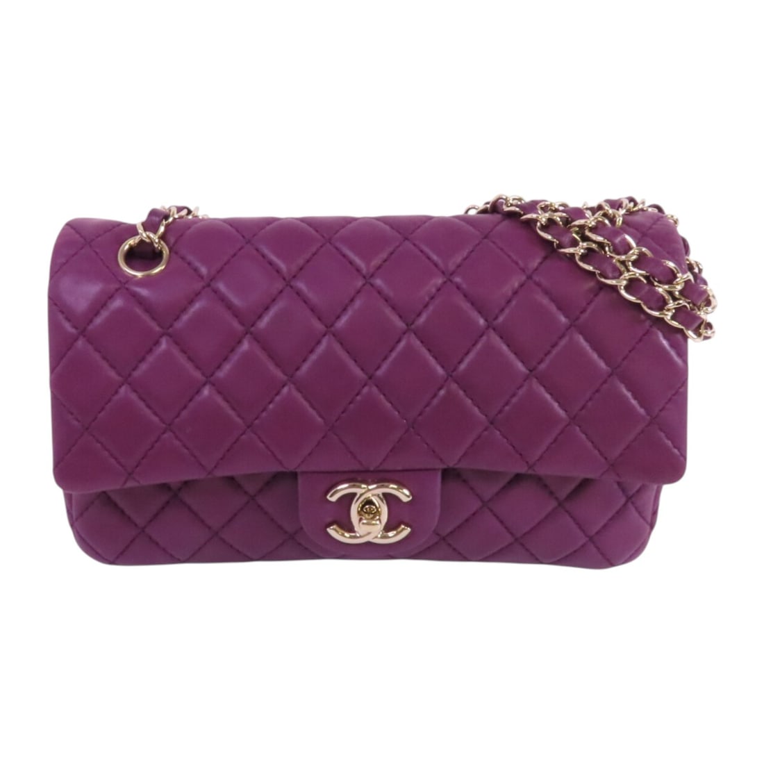 Purple Lambskin CHANEL Classic 25 Shoulder Bag with CC and Gold Hardware: Purple Lambskin CHANEL Classic 25 Shoulder Bag with CC and Gold Hardware This CHANEL Classic 25 chain shoulder bag is crafted from luxurious purple lambskin leather and features the iconic CC logo. Th