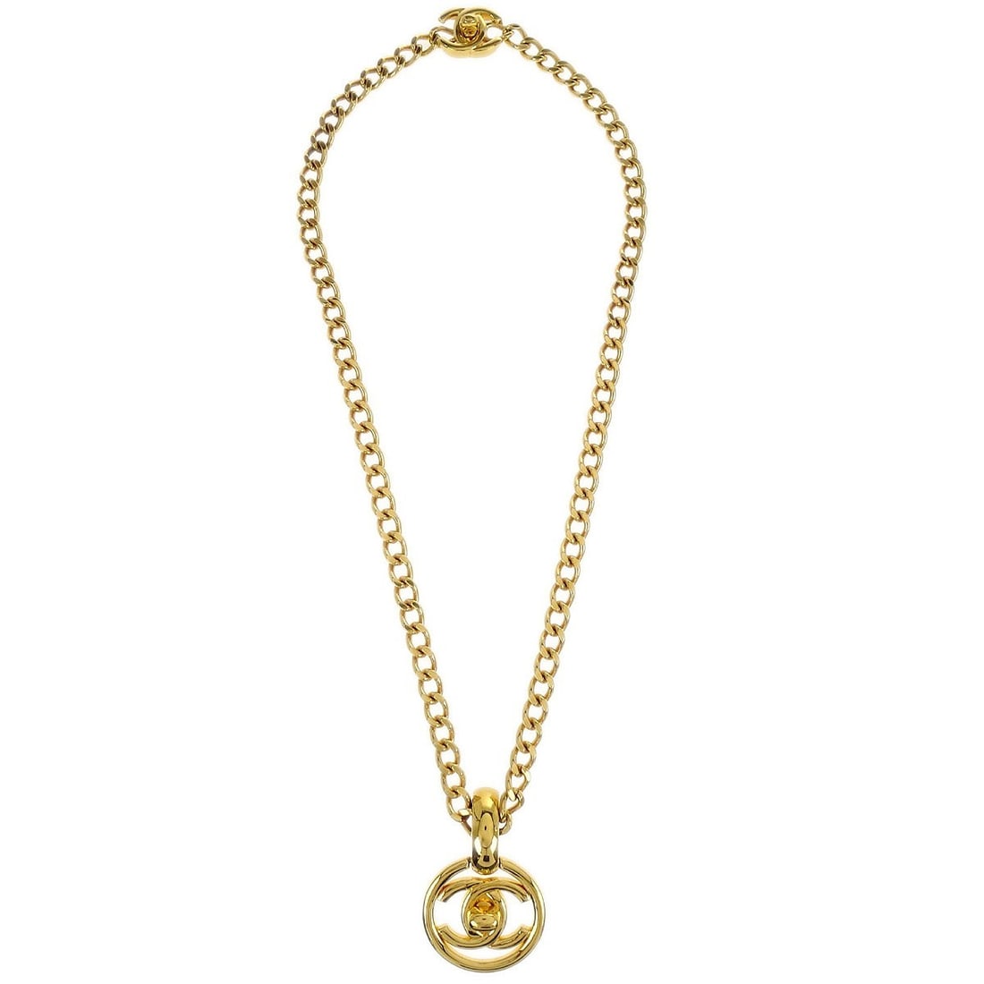 Chanel 97P Gold Plated Turnlock Medallion Pendant Necklace: Chanel 97P Gold Plated Turnlock Medallion Pendant Necklace Elevate your accessory collection with this exquisite Chanel Turnlock Medallion Chain Pendant Necklace. Crafted from gold-plated metal and fe