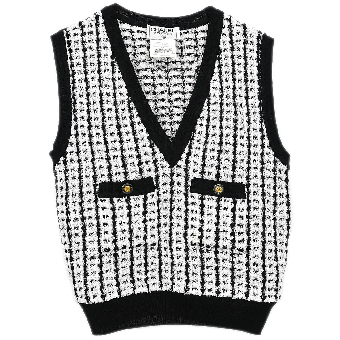 Chanel White Sleeveless V-Neck Knit Vest Top Size #38: Chanel White Sleeveless V-Neck Knit Vest Top Size #38 Elevate your casual wardrobe with this chic sleeveless vest sweater top from Chanel. Featuring a stylish V-neckline and crafted from a comfortable