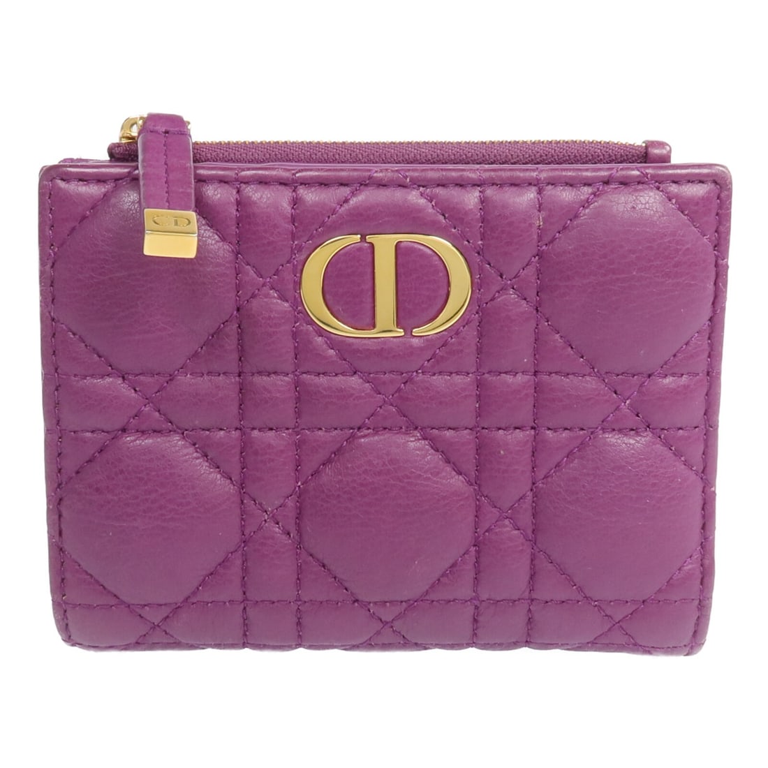 Dior Purple Lambskin Leather Bi-Fold Wallet with Gold Hardware: Dior Purple Lambskin Leather Bi-Fold Wallet with Gold Hardware This Christian Dior bi-fold wallet is crafted from lambskin leather in a rich purple color. Designed for regular use, it features a class
