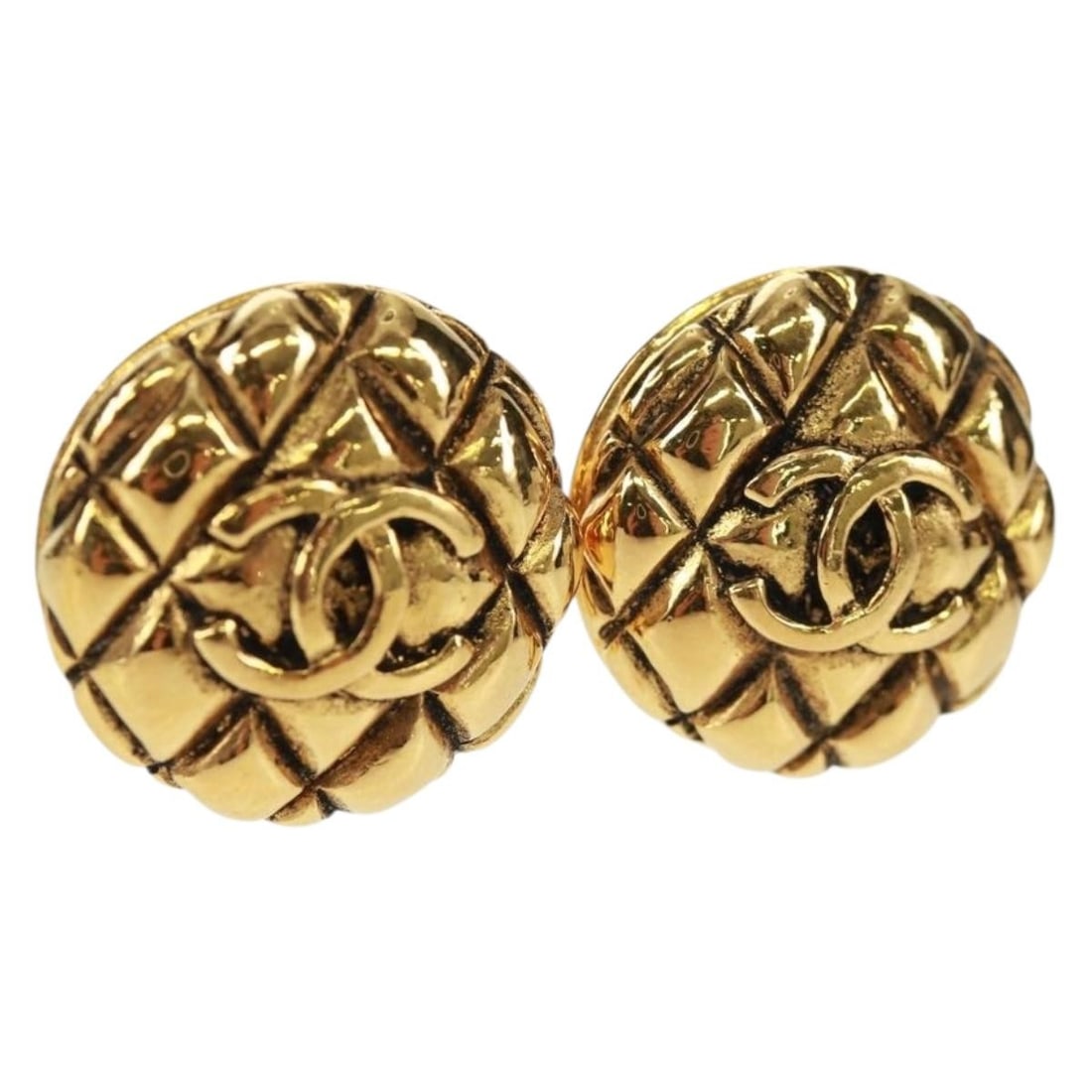Gold Metal Earrings CHANEL Matelasse COCO Mark CC Logo: Gold Metal Earrings CHANEL Matelasse COCO Mark CC Logo These CHANEL Matelasse COCO Mark earrings feature the iconic CC logo and are crafted from gold-tone metal. Made in France, they exhibit slight su