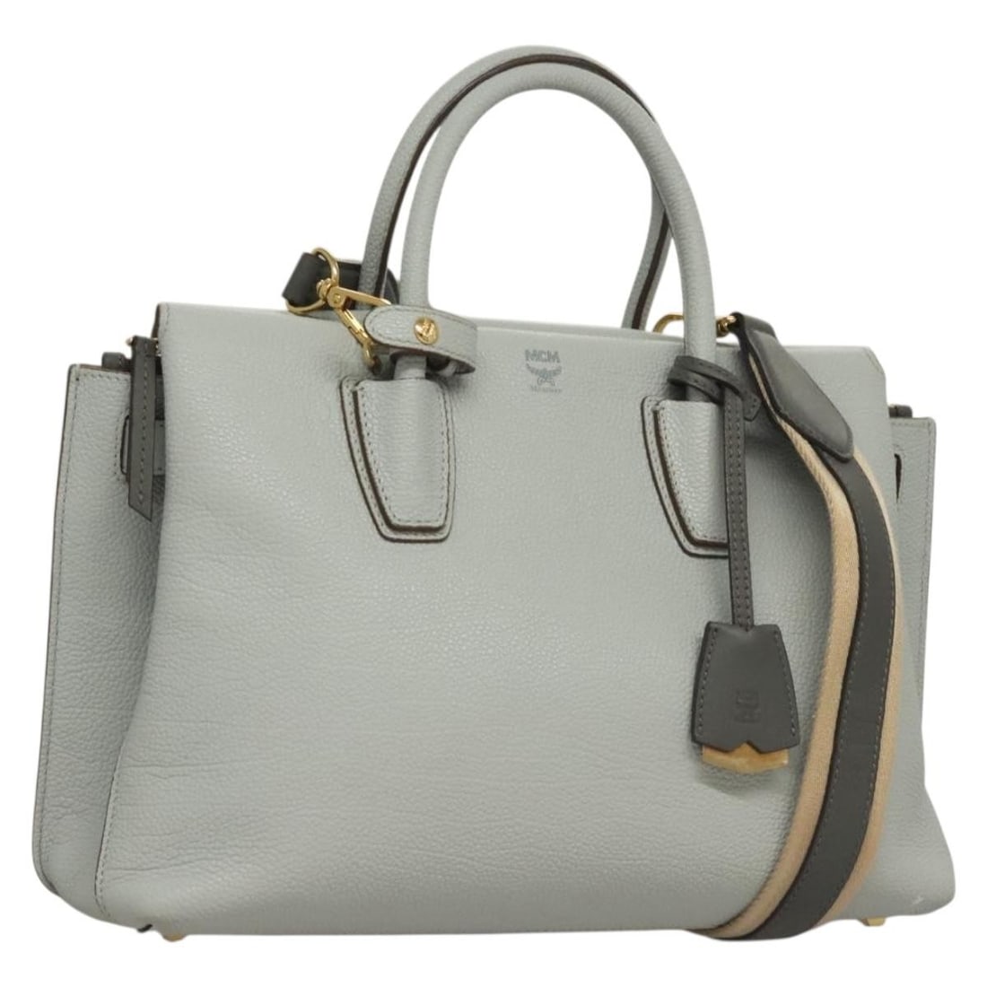 MCM Leather 2-Way Hand Bag Light Blue Gold Auth BA4220: MCM Leather 2-Way Hand Bag Light Blue Gold Auth BA4220 This MCM Hand Bag is a stylish accessory crafted from premium leather, featuring a stunning light blue and gold color combination. It showcases a