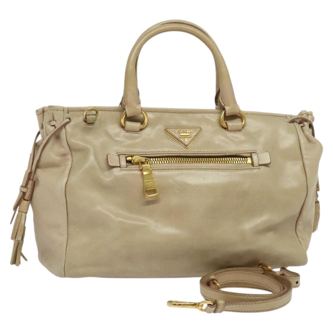 Convertible Beige Leather Tote by Prada with Front Pocket: Convertible Beige Leather Tote by Prada with Front Pocket This Prada Front Pocket Convertible Tote in beige leather is designed for women, combining style with versatile functionality. It features a c