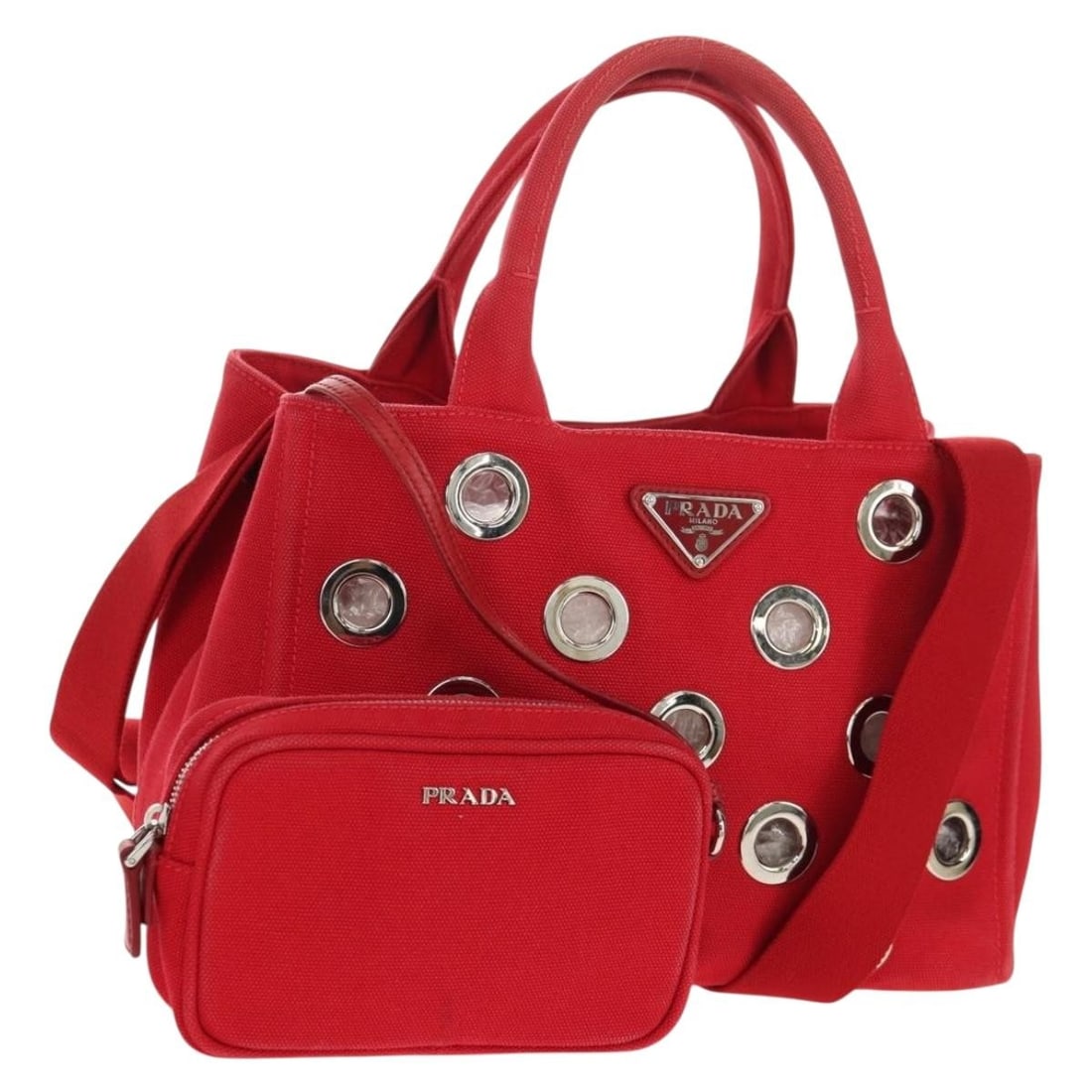 Red Canvas Prada Canapa PM Convertible Tote Bag 27x18x14cm: Red Canvas Prada Canapa PM Convertible Tote Bag 27x18x14cm This Prada Canapa Convertible Tote is crafted from red canvas and designed for women. It features grommet embellishments and a convertible st